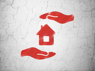 Image showing Insurance concept: House And Palm on wall background