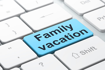 Image showing Tourism concept: Family Vacation on computer keyboard background