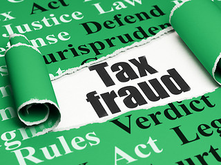 Image showing Law concept: black text Tax Fraud under the piece of  torn paper