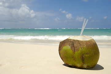 Image showing Coconut drink on exotic beach