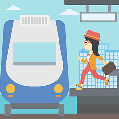 Image showing Woman running along the platform.