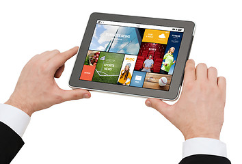 Image showing close up of hands holding tablet pc with