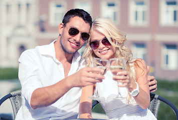 Image showing couple drinking wine in cafe