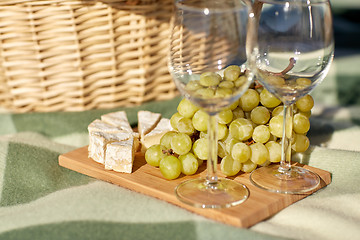 Image showing picnic basket with wine glasses, grapes and cheese
