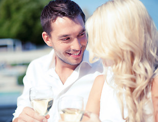 Image showing couple drinking wine in cafe