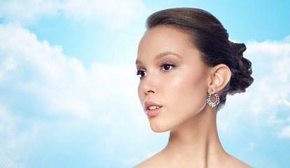 Image showing close up of beautiful woman face with earring