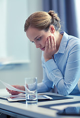 Image showing businesswoman having problem in office