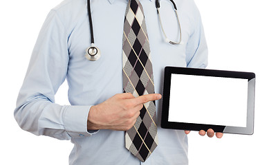 Image showing Doctor holding tablet with copy space and clipping path for the 