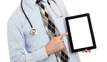 Image showing Doctor holding tablet with copy space and clipping path for the 