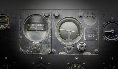 Image showing Different meters and displays in an old plane