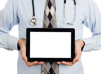 Image showing Doctor holding tablet with copy space and clipping path for the 