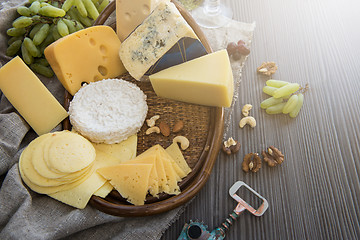 Image showing Various types of cheese set