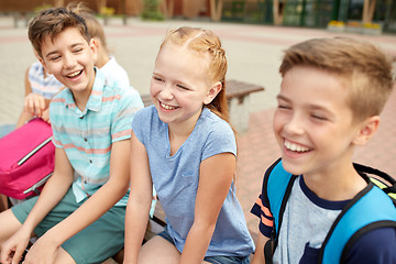 Image showing group of happy elementary school students talking