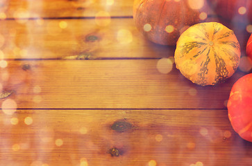 Image showing close up of pumpkins on wooden table at home