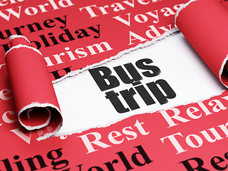 Image showing Vacation concept: black text Bus Trip under the piece of  torn paper