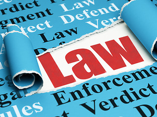Image showing Law concept: red text Law under the piece of  torn paper