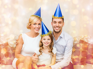 Image showing happy family in hats celebrating