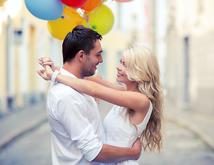 Image showing couple with colorful balloons