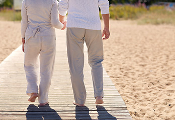 Image showing close up of senior couple on summer beach