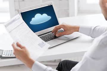 Image showing businessman with laptop computer working at office