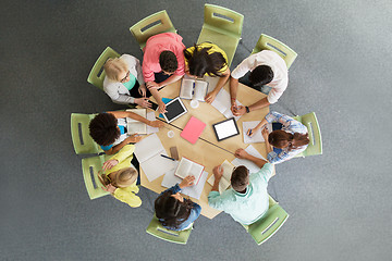 Image showing group of students with tablet pc at school library