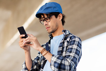 Image showing hipster man texting message on smartphone