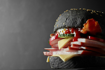 Image showing Japanese Black Burger with Cheese.