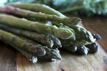 Image showing Asparagus on wooden block