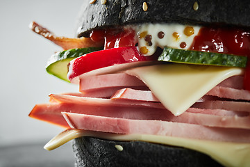 Image showing Burger with ham and black bun