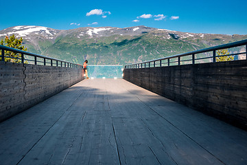 Image showing Woman enjoying scenics from Stegastein Viewpoint