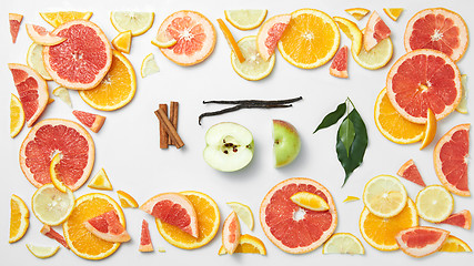 Image showing set of citrus fruit with leaves on white background