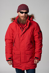 Image showing Man wearing red winter Alaska jacket