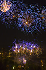 Image showing Fireworks over a town