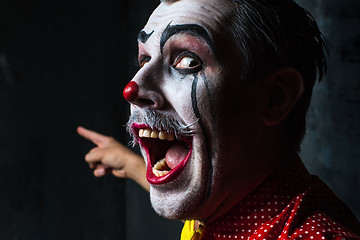 Image showing Terrible crazy clown and Halloween theme