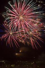 Image showing Fireworks over a town