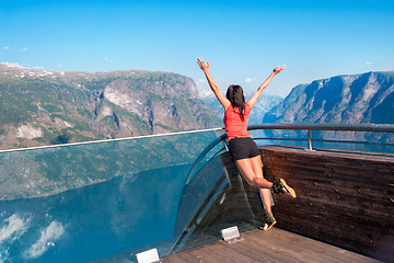 Image showing Woman enjoying scenics from Stegastein Viewpoint