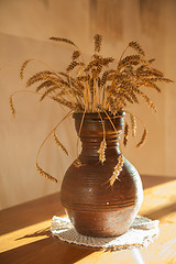 Image showing wheats and old jug