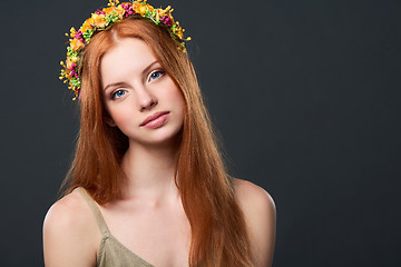 Image showing Beautiful red haired woman in flower wreath