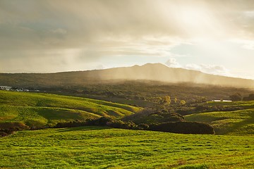 Image showing Green landscape with coming rain