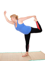 Image showing Yoga trainer standing, showing poses.