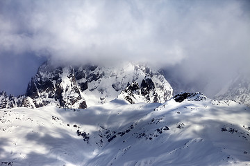 Image showing Mount Ushba in fog at sun winter day