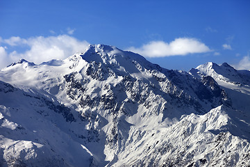 Image showing Snow winter mountains at nice sun day