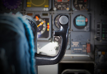 Image showing Center console and throttles in airplane