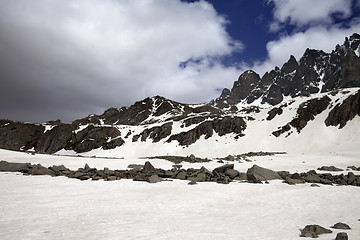 Image showing Snow mountain and gray clouds before storm