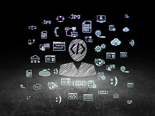 Image showing Software concept: Programmer in grunge dark room
