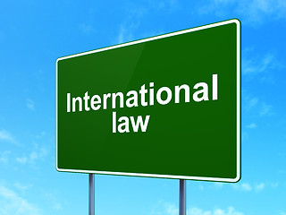 Image showing Politics concept: International Law on road sign background