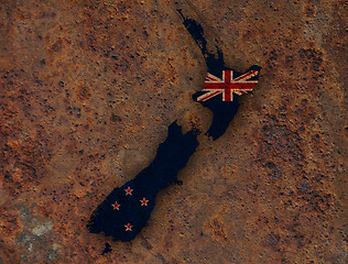 Image showing Map and flag of New Zealand on rusty metal,