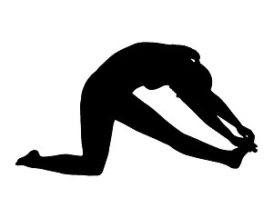 Image showing Silhouette of woman doing yoga