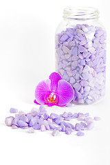 Image showing Salt in the bottle and orchid flower