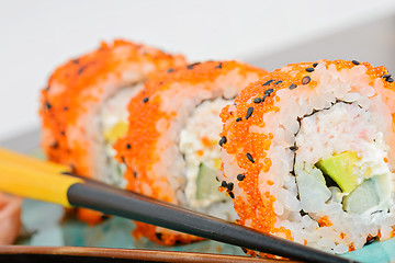 Image showing California maki sushi with orange masago